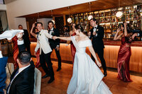 Wedding entrance with bride, groom and their bridal party at The Marion in Canberra ACT