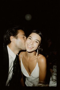 u3981682316_groom_whispering_something_into_brides_ear_while__0d3103f0-ad35-4465-a1af-2dd12571fbcb_1