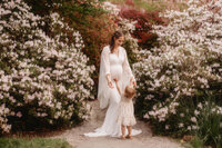 Maternity Photos in Charleston, SC -- Expectant mother poses for Maternity Portraits at Hampton Park in downtown Charleston, SC.
