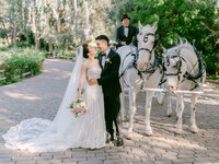 Bride and groom surrounded by lush bougainvillea during a garden wedding wine country temecula valley California