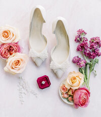 bridal shoes with colorful pink, purple, and yellow flowers