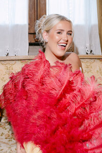 bride-red-feather-fan-editorial-portrait.jpg