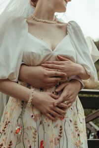 Newly married couple doing documentary and cinematic photos for their wedding / elopement at their blue ridge airbnb. Photos by Crimson Conure Photography based in Kennesaw, Georgia and Denver, Colorado