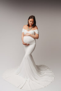 Expectant Mother poses for Maternity Portraits at Holy City Babies Portrait Studio in Charleston, SC.