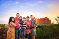 Allie Cline with extended family at sunset overlooking red rock landscape