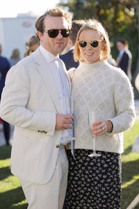 Guests enjoy outdoor cocktail hour during Nantucket wedding reception.
