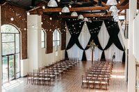 Indoor ceremony setup at one of the best wedding venues near Louisville, The Refinery North
