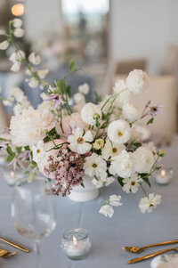 Wedding floral arrangement on reception table, taken by one of the top wedding photographers in Cincinnati