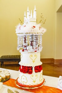 Venice Beach Los Angeles wedding photography detail shot of a castle shaped wedding cake with elegant design, captured in true to life color and soft natural light.