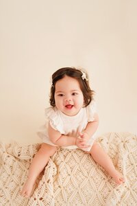 Premium high-end sitter baby photography by Japanese photographer specializing in elegant Omakase style sitter baby portraits