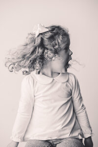 Little girl poses for Personality Portraits at Holy City Babies Portrait Studio in Charleston, South Carolina.