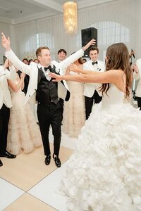 groom dances with bride belle mer
