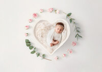 Infant posed for Newborn Photos in Charleston, SC.