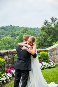 Bride and Groom Hugging in Garden