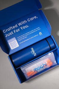 Open Mochi welcome kit showing branded packaging and cold-chain contents