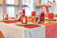 Venice Beach Los Angeles wedding photography detail of guest table decorations with florals, candles, and elegant place settings, captured in true to life color and fine art style.