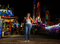 Senior portrait at the Greater Gulf State Fair in Mobile, Alabama — full body pose