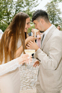 Unposed and candid moments of wedding guests enjoying the celebration, captured in a storytelling editorial style.