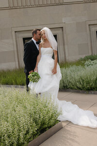 Film photography captures editorial ceremony moments at Old Post Office Chicago with Lauren Alatriste's fashion forward approach, showcasing architectural grandeur while maintaining sophisticated luxury wedding imagery and authentic emotional
storytelling.