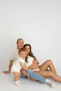 family portrait during studio maternity photoshoot