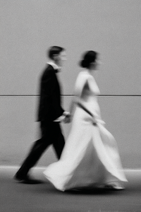 u3981682316_Close-up_of_bride_and_groom_walking_hand-in-hand__21d44acc-ca35-4050-856f-a14cf768f7a6_3