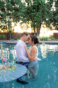bride and groom garden wedding pool portrait at rainbow oaks ranch in sanger california
