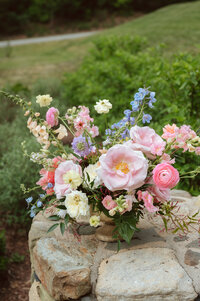 Floral arrangement of peonies and garden roses by Flowergirl Cville. Photography Jessa Rose Moments.