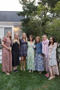 Guests pose together for photo during Nantucket welcome party. Deborah Zoe Photography.