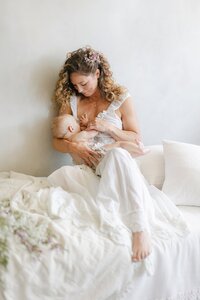 mom nursing baby in studio session