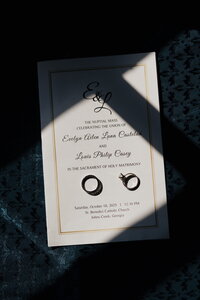 flat lay of evelyn and louis's wedding at St. Benedict Catholic Church in Johns Creek, Georgia