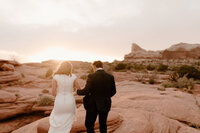 man and woman eloping at canyonlands national park