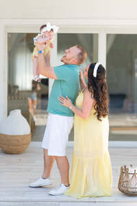 Mom dad and baby family Spring  Miami Lifestyle Photoshoot in beach house