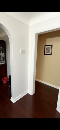 Victorian house with freshly painted trim in Plymouth, MN by TD Interiors.