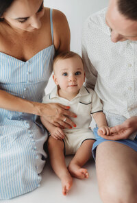 Baby celebrates his first birthday with Cake Smash Pictures at Holy City Babies Portrait Studio in Charleston, SC.