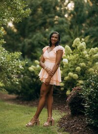 Senior portrait at Bella Sera Gardens in Loxley, Alabama — posing.