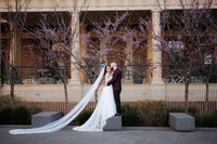 Bride and groom sharing their first emotional hug after their Adelaide wedding ceremony