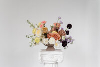 Flower arrangement for wedding captured by Detroit, MI wedding photographer