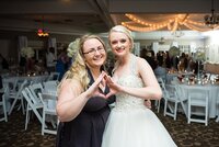 Mahlia with another AOII sorority sister at a wedding