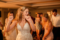 Close-up of the bride's lace wedding dress during her Turks and Caicos destination wedding