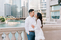 Wrigley Building summer engagement session showing riverwalk romantic couples moments