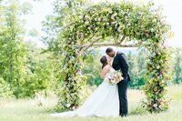 Bride and Groom Kissing at Mayfair Farm