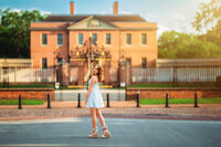 High school senior portrait of girl in white dress photographed at Tryon Palace in New Bern, North Carolina