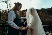 Newly married couple doing documentary and cinematic photos for their wedding / elopement at their blue ridge airbnb. Photos by Crimson Conure Photography based in Kennesaw, Georgia and Denver, Colorado