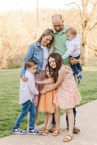 Family photo taken outdoors in Hartwood Acres.  Wexford Maternity Photographer