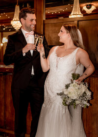 Bride and groom toasting before their wedding at The Troutdale House by the Sandy River