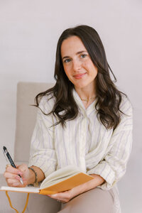 Therapist taking notes during a therapy session, bay area branding session