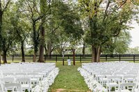 Wide view of outdoor ceremony seating on the lawn at Bradshaw Duncan House, a top outdoor wedding venue near Louisville.