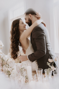 Bride and groom at Maison Charlottesville. Florals by Flowergirl Cville. Amy Mitchell Photography.