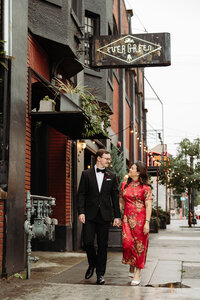 Chinese wedding outfit with bride and groom at the evergreen