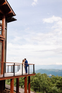 Knoxville Wedding Photographer capturing bride and groom kissing in Smoky Mountains